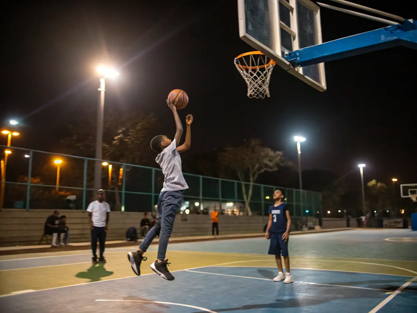 An inspiring image of students playing basketball in the school gymnasium, highlighting their agility, coordination, and competitive spirit.